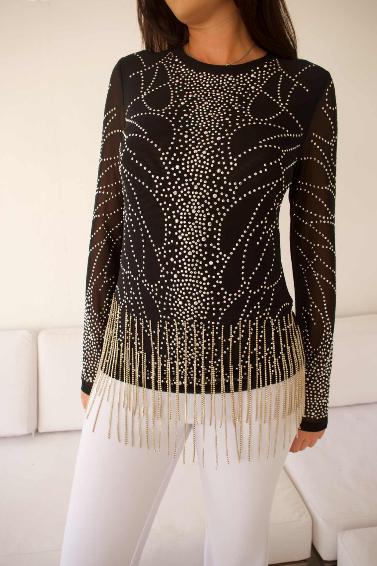 Close-up of the sparkle fringe mesh top, highlighting the glittering details and intricate fringe accents.