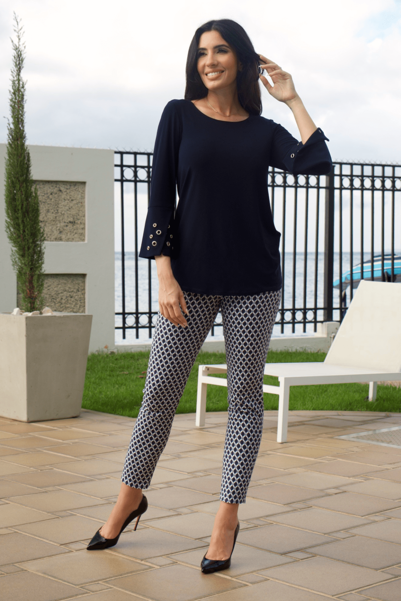 Women's navy and white hexagon print pull-on pants, featuring a stylish geometric pattern and comfortable fit.