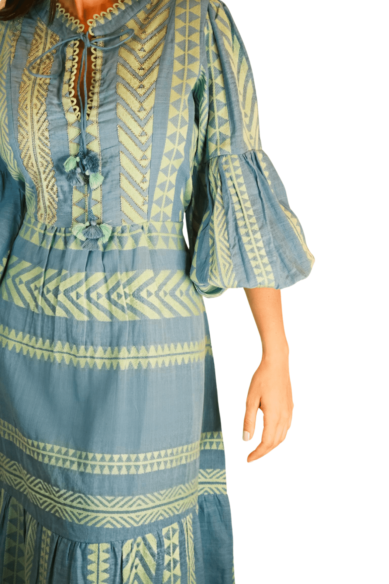 Detailed view of small bead embellishments on the chest of a women's blue and green maxi dress, highlighting its sophisticated design.